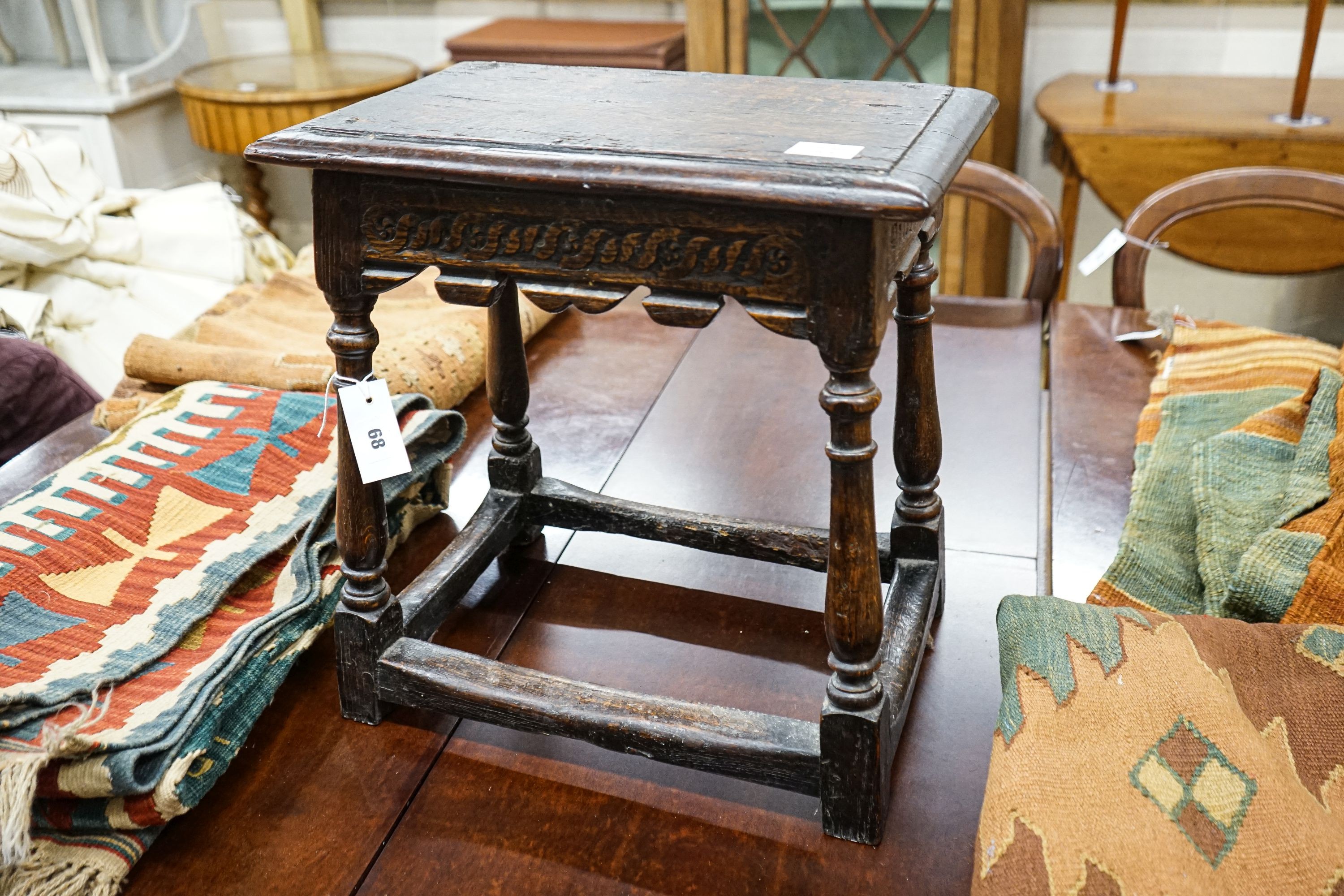 A 17th century style oak joint stool, width 46cm, depth 30cm, height 48cm
